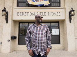 Bryant Nolden, executive director of the Friends of Berston, stands outside the facility on North Saginaw Street in Flint.