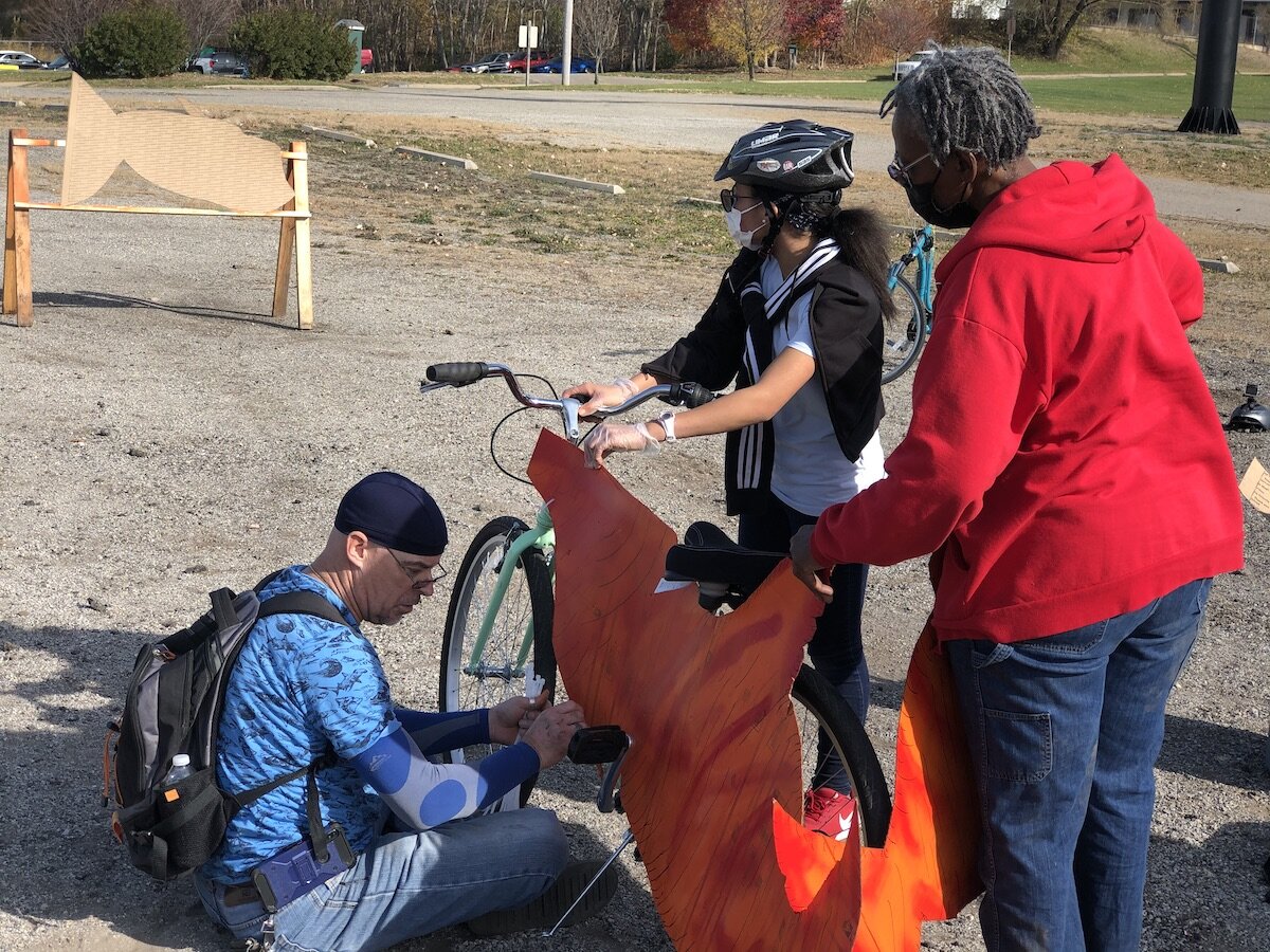 Artists, parents, and other community members helped kids paint and design "silly bikes" for a parade on November 7.