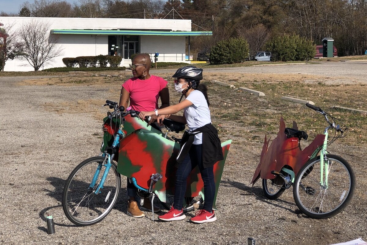 Artists, parents, and other community members helped kids paint and design "silly bikes" for a parade on November 7.