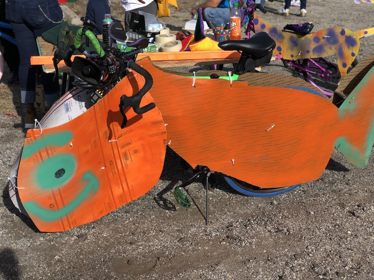 Artists, parents, and other community members helped kids paint and design "silly bikes" for a parade on November 7.