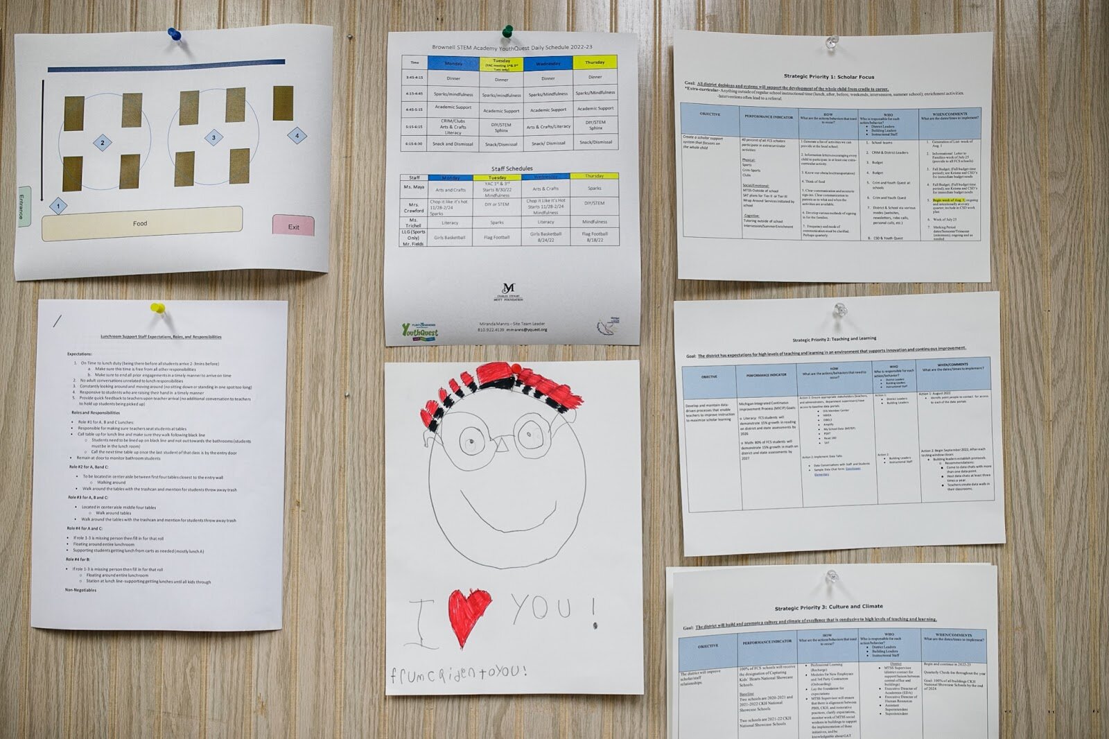 Inside of Principal Shalonda Byas’ office, posted on a wall, are schedules and reminders surrounding artwork from a student on Thursday, Aug. 18, 2022, at Brownell STEM Academy.