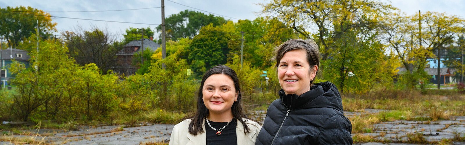 CEDAM’s Emily Reyst with Boot Camp graduate Christine Holmes, Woodbridge Neighborhood Development director of policy and property development.