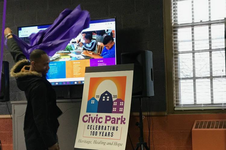 The logo for the Civic Park centennial celebration is unveiled during a launch party March 9, 2019 at Joy Tabernacle Church.