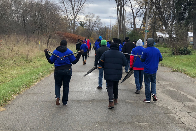 An army of volunteers helps with the cleanup effort on Nov. 10, 2018, despite frigid temperatures.