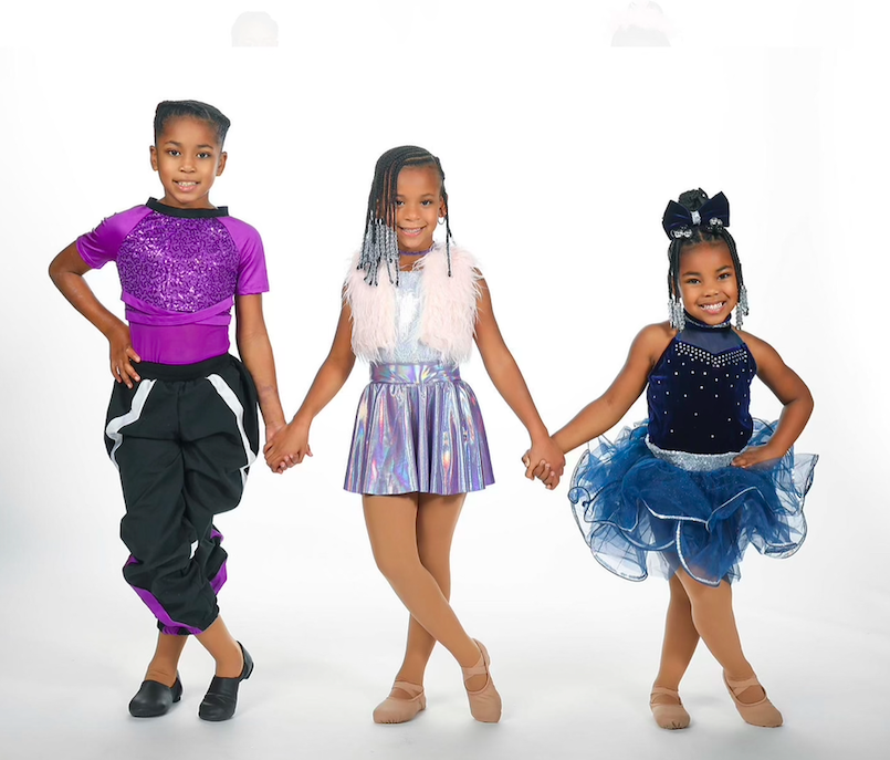 Three young dancers from the Heart of Worship Dance Studio in Flint.