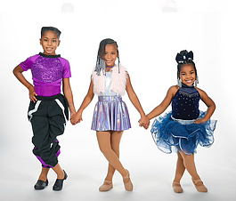 Three young dancers from the Heart of Worship Dance Studio in Flint.