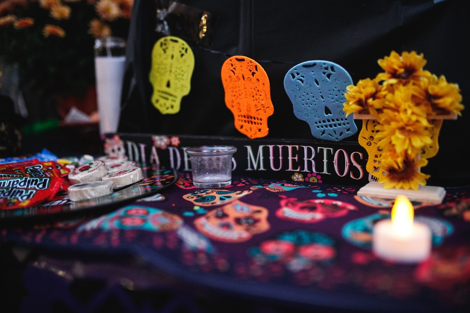 An ofrenda is decorated with traditional ofrenda art during the Latinx Technology and Community Center's Dia de Los Muertos celebration on Wednesday, Nov. 2, 2022 in downtown Flint.