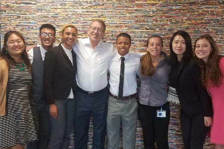 The 2017 class of Diplomat Fellows pose with CEO Phil Hagerman.