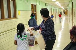 Students who attend Family Night at Durant Turri-Mott Elementary receive learning packets in what educator Debra Rinoldo-Hopkins describes as “make it, take it bags.”
