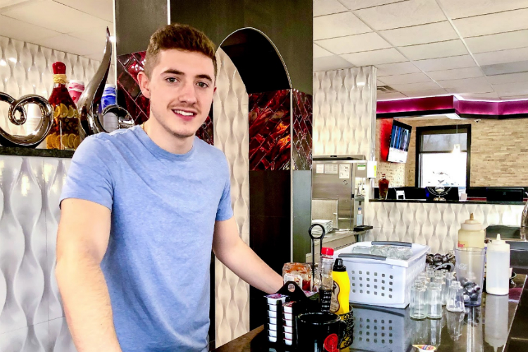 Dominic Berishaj opened Dom's Place on Flint's westside in September with help from his family, which owns the nearby Captain Coty's restaurant.