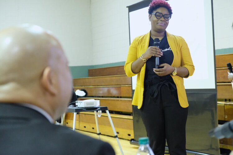 La'Asia Johnson creator of Elle Jae Essentials listens to feedback from the judging panel at the Pitch for $ K event. 