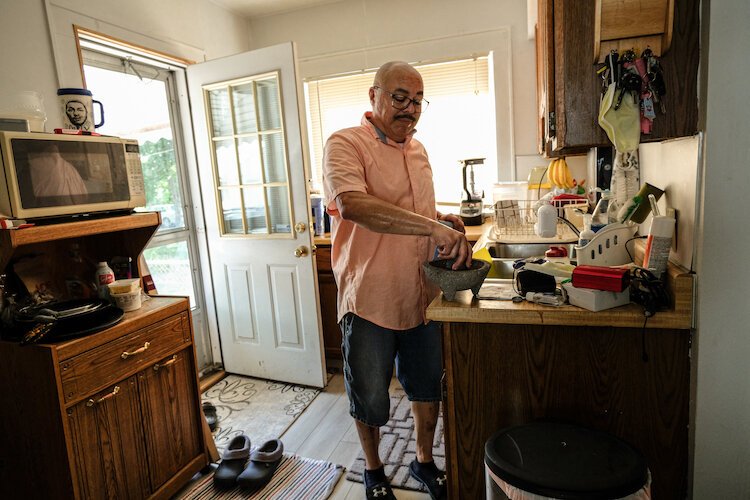 Ricky Reyes' kitchen still holds many of the same cooking tools his mother used to make staple meals, like the molcajete used to crush herbs and spices.