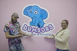 Iresha Dorsey (right) and her fiance, Sunny (left), of Dumboes Elephant Ears & Funnel Cakes. The playful logo sets the tone for it to be a "fun place to come and gorge on sweet fried treats." 