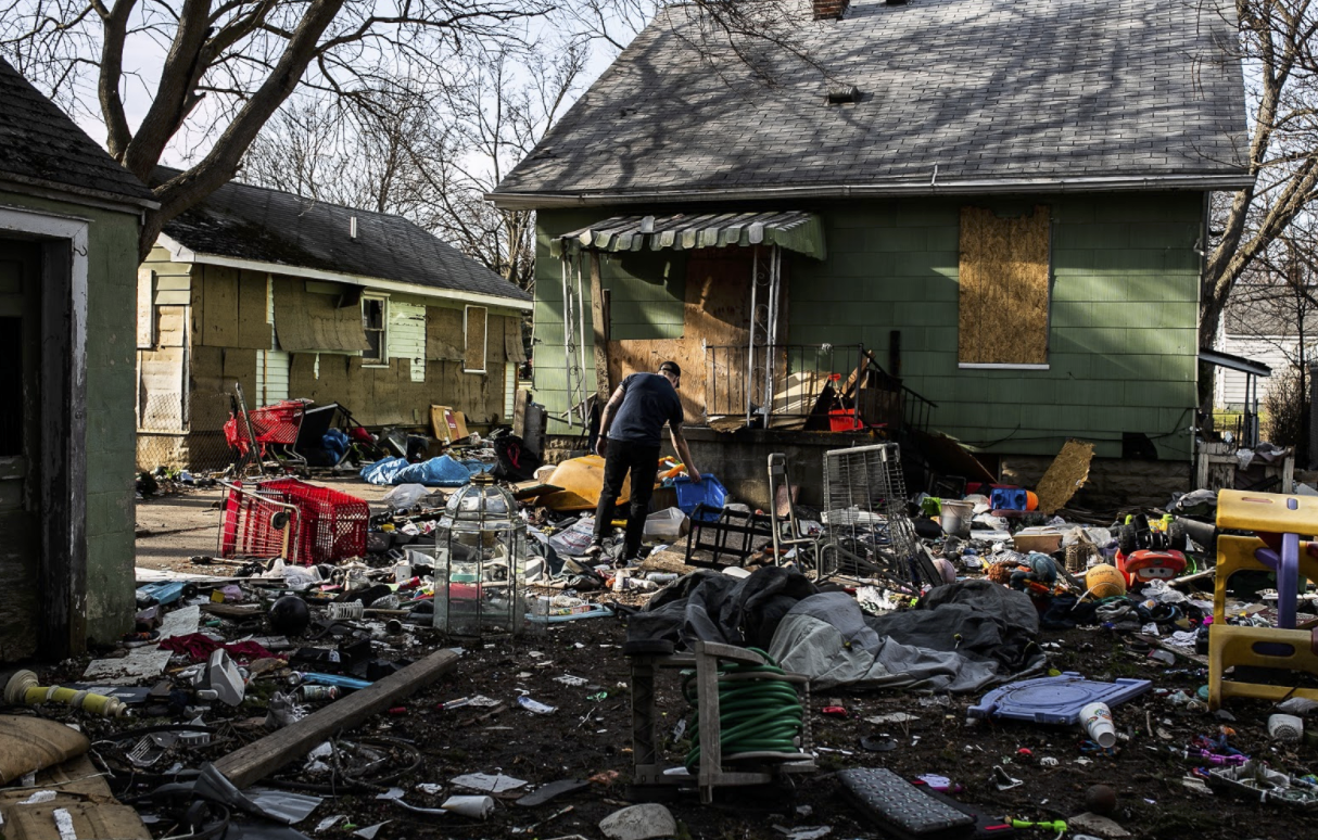 The backyard that borders Elder's backyard progressively grew as an illegal dumping spot for several years before residents cleaned it up on May 15.