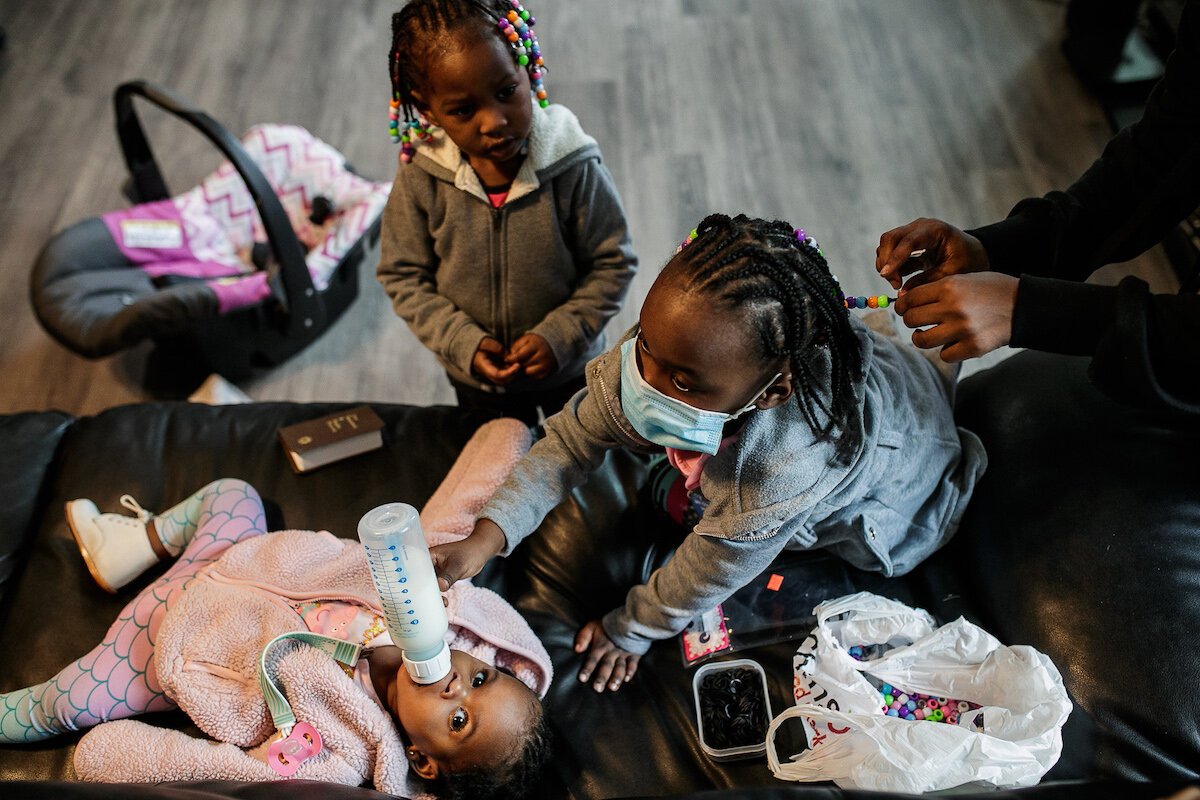 Hodo's children get ready for the day while residing at Shelter of Flint.