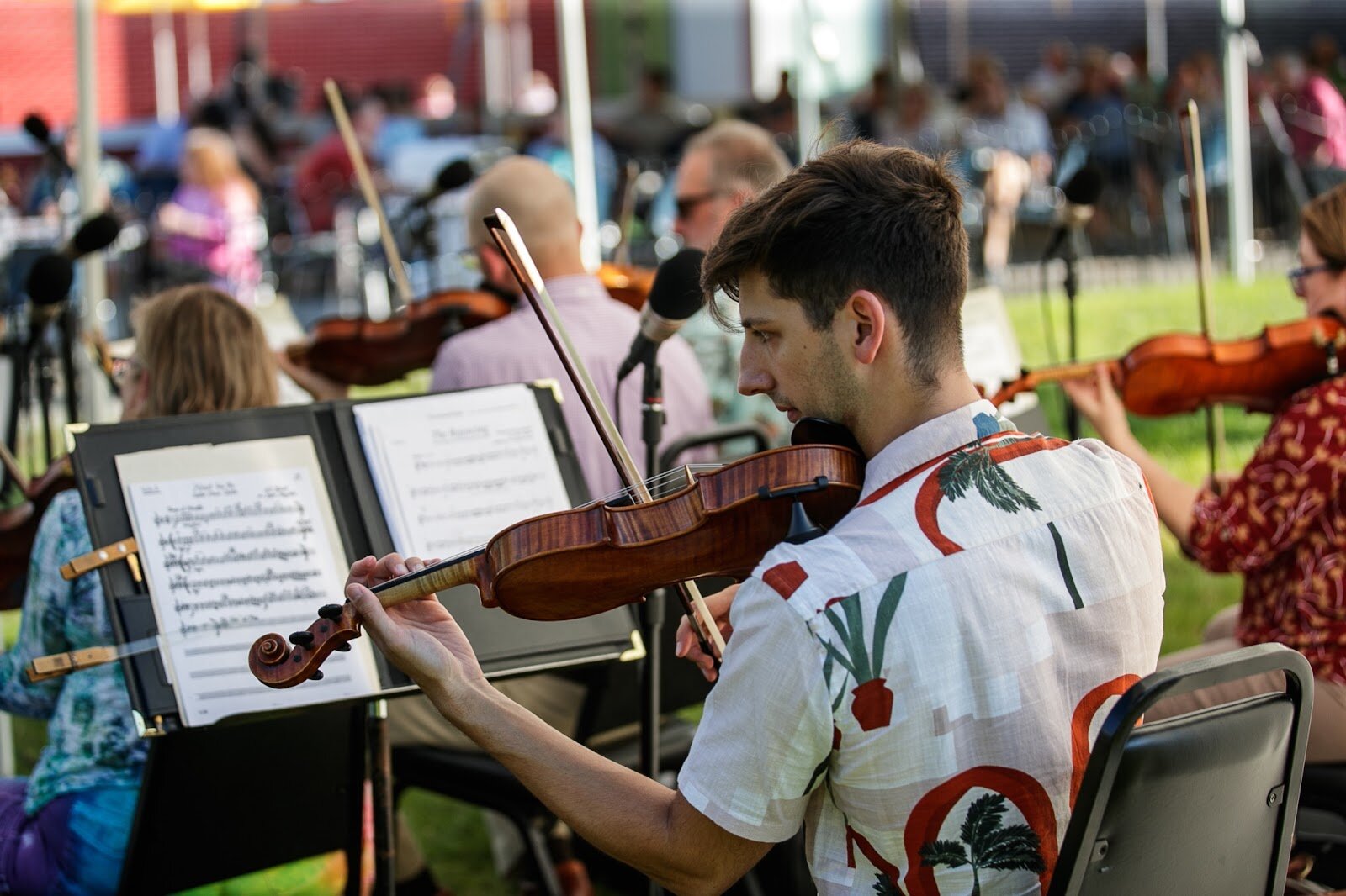 The Flint Symphony Orchestra ensemble plays live music during Family Night at 'Late Night at the FIA' on Friday, Aug. 19, 2022. 