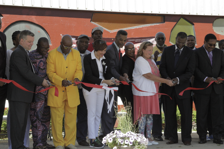 Flint Development Center celebrated its official ribbon-cutting and grand opening on Thursday, June 8, 2017. The multi-purpose facility will house offices and programs of the Genesee County Parks and Recreation Commission, YMCA of Greater Flint, Flin