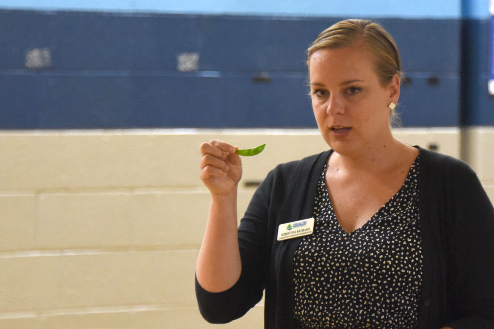 Health Department of Northwest Michigan Community Health Coordinator Kirstyn Horan speaks to children at the YMCA summer day camp at Petoskey's Ottawa Elementary School.