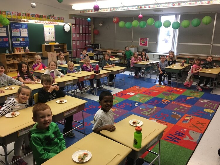 Students prepare for a food tasting.