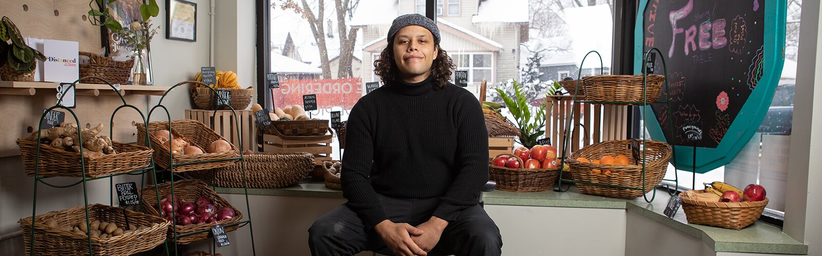 Anishinaabe chef and entrepreneur Camren Stott at South East market in Grand Rapids.