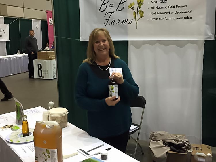 Bonnie Blackledge displays product from B & B Famrs