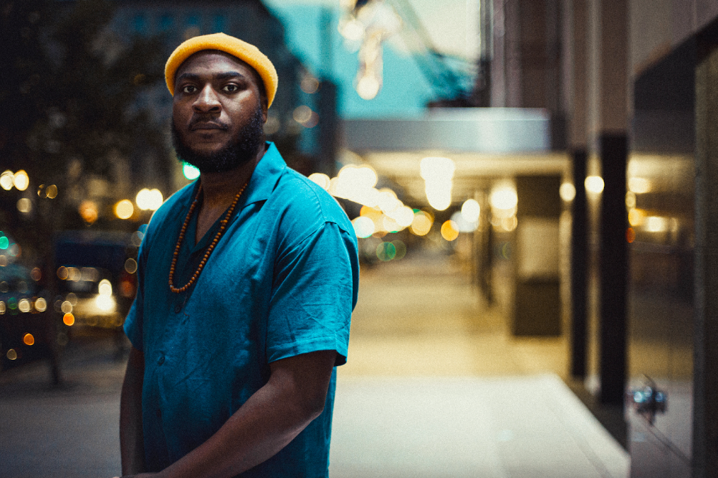 Music artist Anthony Feimster, known as Feimstro, stands posed outside Blackstone's Smokehouse after the opening night of his downtown tour on June 10, 2023.