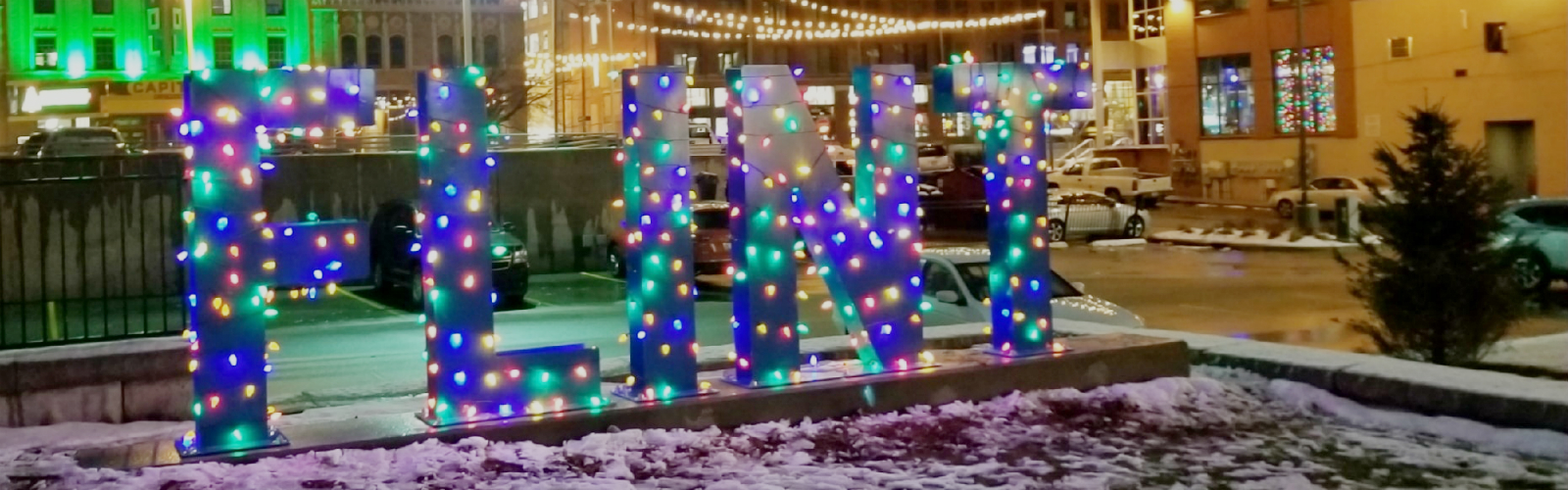 The new Flint sign, installed in July before Alley Fest, is lit up for Christmas thanks to John and Kathleen Gazall.