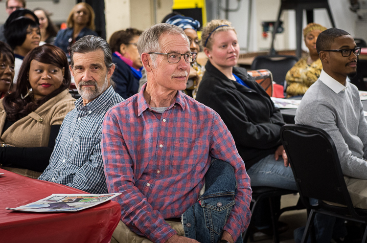 Attendees listen to presentations at the Flint SOUP October event at Factory Two in Flint.