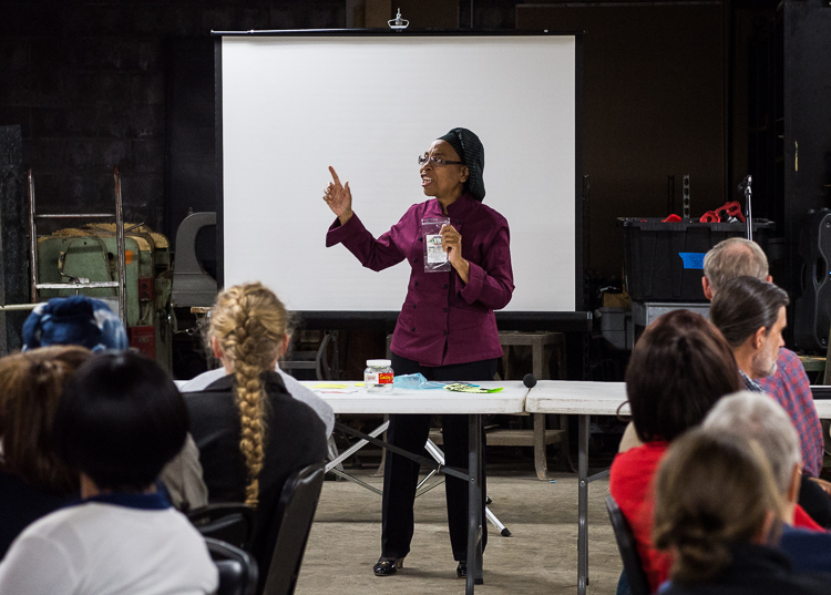 Charma Dompreh presents her business, Charma's Green Chips, at Flint SOUP during the October event at Factory Two in Flint.