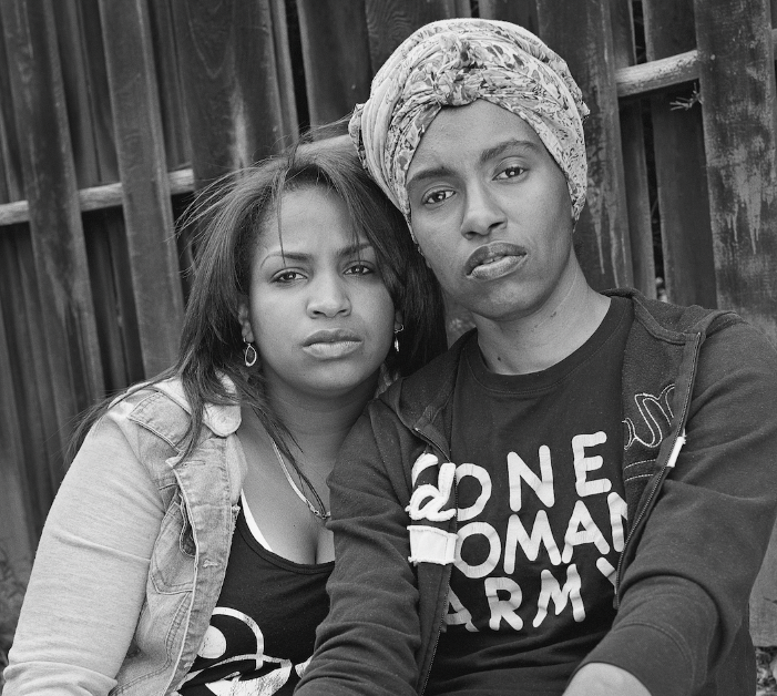 Flint natives Shea Cobb (left) and Amber Hasan (right) photographed together as a part of the 'Flint Is Family In Three Acts' exhibition. 