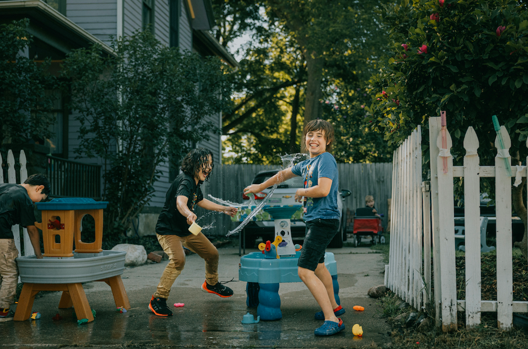 Kids and families enjoy a sunny evening at Porch Fest on July 18, 2025. 