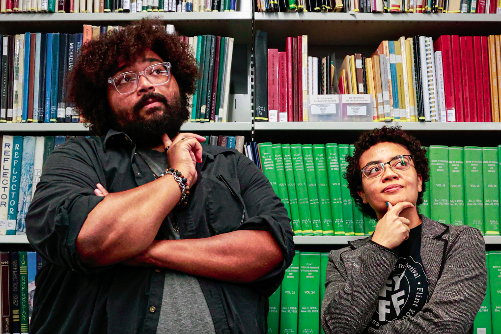 Emmy award-winning filmmakers and Flint Youth Film Festival leaders Justin R. Brown and Alexandria Douglas inside the Gloria Coles Flint Public Library on July 11, 2023. 