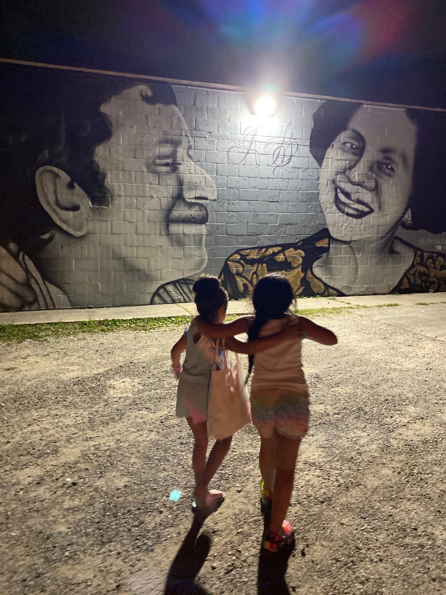 Addis Meltzer’s daughter Alexis Portillo and Sheri Meltzer’s daughter Maricela Gurrola, fourth generation, looking at the first that started it all.