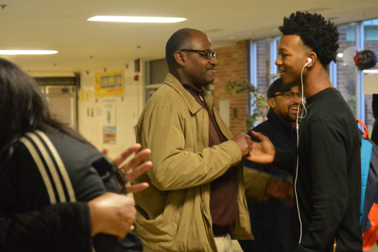 Smiles, handshakes and high fives greet students once a month at both Northwestern and Southwestern.