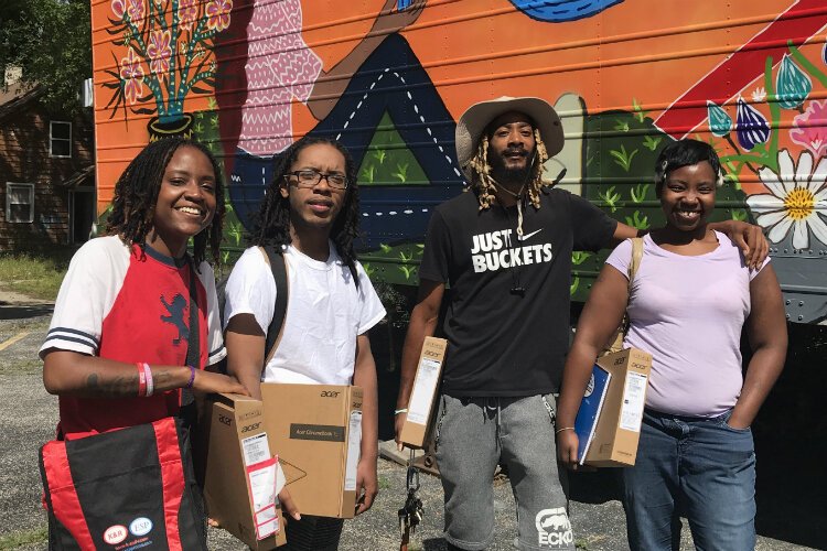 Members of the Flintside Journalism Fellowship for the Civic Park neighborhood include (left to right) Anna Mansfield, Derrick Poe, Cornelius Jones, Camelia Pano.