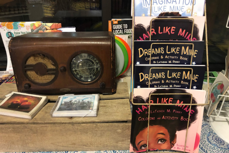 A display of LaTashia M. Perry children's books on display at The Local Grocer, 601 MLK Ave. in Flint.
