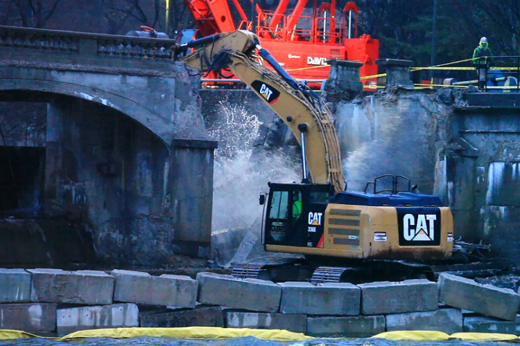 Work continues on the removal of the Hamilton Dam, part of a project designed to revive the Flint River downtown. 