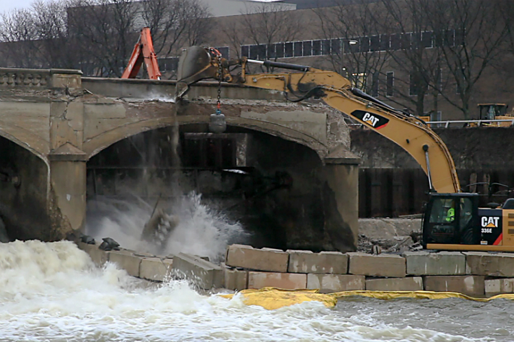 Work continues on the removal of the Hamilton Dam, part of a project designed to revive the Flint River downtown. 