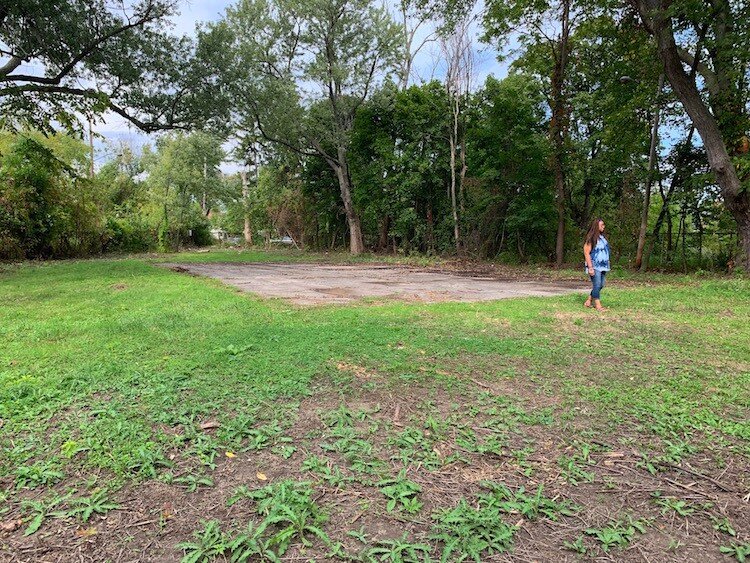 "Isn't she beautiful?" says Linn Aikens, who led efforts to cleanup Civic Park's Hidden Park — and thanks to some help, succeeded in a single summer.