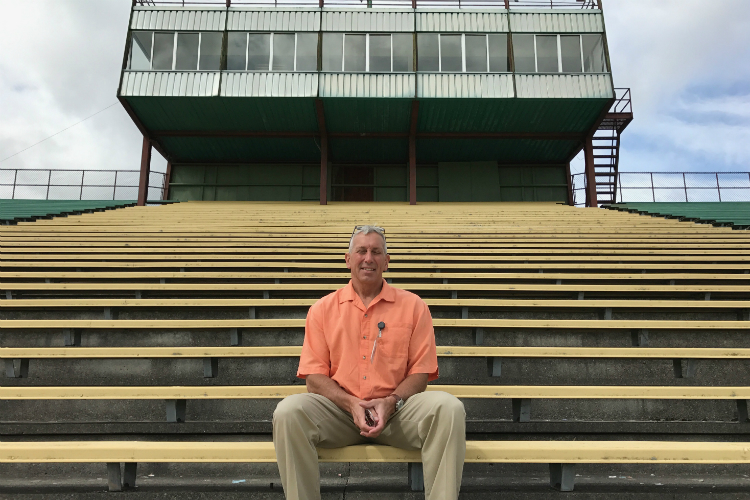 Flint Schools Athletic Director Jamie Foster poses at the Flint Jaguars' renovated Houston Stadium.