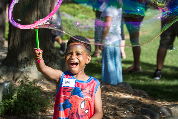 Will Morgan III, 6, of Flint Township creates a bubble at the 8th Annual Miracle Picnic.  Will receives his last treatment for leukemia next month at Hurley Children's Hospital.