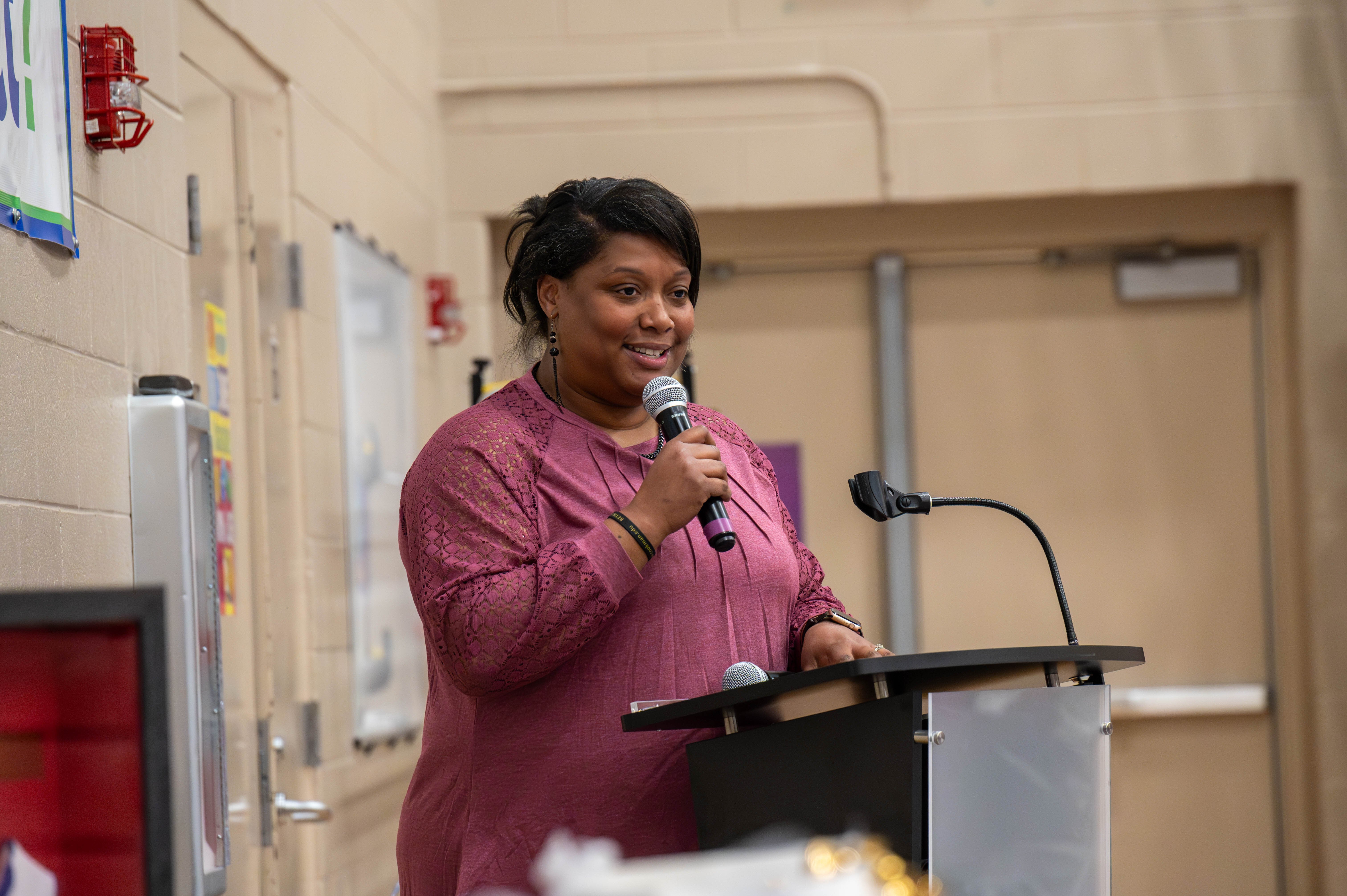 Jashell Mitchell-Cross addresses the room during the Invisible Giants Foundation's National Girls and Women’s in Sports Day event.