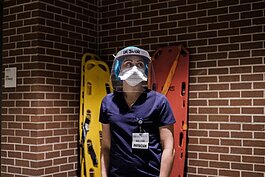Veloso photographed nurses, doctors, environmental services workers, first responders, EMTs, and police officers in the series.