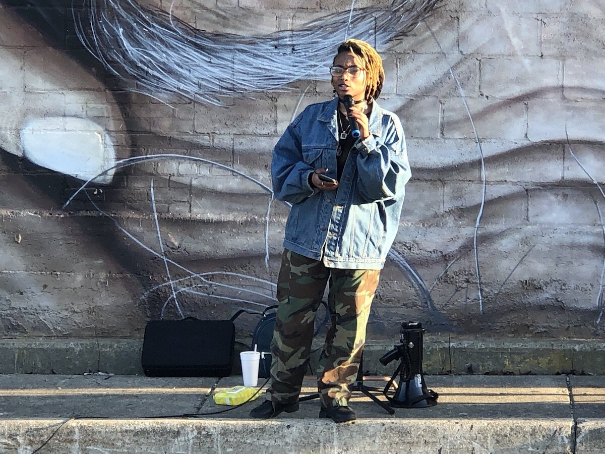 Jo Ikigai speaks at a Breonna Taylor rally in Flint in March.