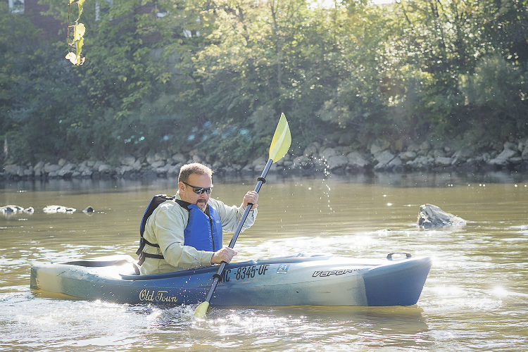 Mike Walsh of Burton begins to paddle down the Flint River at Kayak Flint.