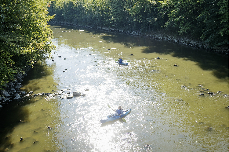 Burton residents Tammy (front) and Mike Walsh make their way 1.5 miles down the Flint River. 