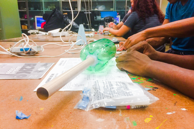 Using bottles, cardboard tubes, glue guns and some know how—high school students build rockets in Kettering's AIM program.
