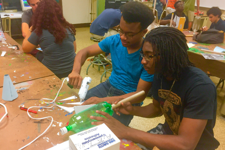 Using bottles, cardboard tubes, glue guns and some know how—high school students build rockets in Kettering's AIM program.