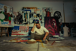 Flint native Keyon Lovett pictured inside his garage-turned-art studio on Jan. 29, 2024. (Anthony Summers | Flintside.com)