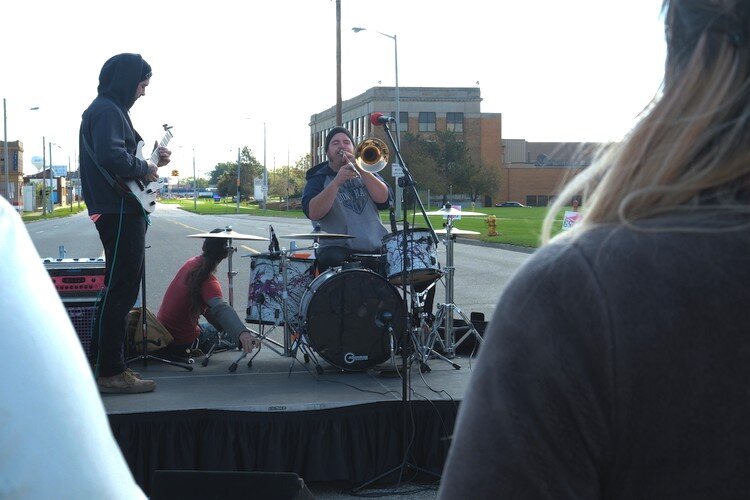 City Scape was one of the local bands that entertained festival-goers from a stage in the middle of Hemphill Road during Flint's Free City Mural Festival.